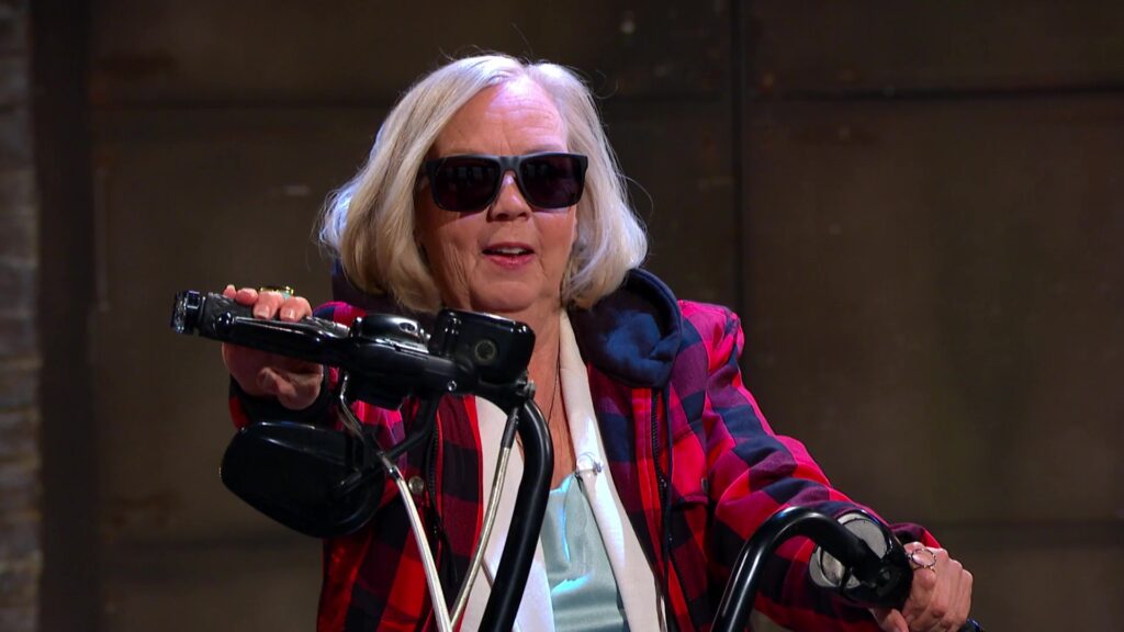 Deborah Meaden sat on a motorcycle wearing sunglasses