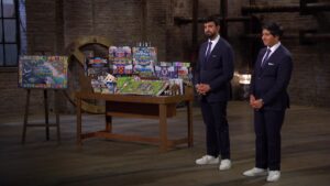 Entrepreneurs Raj and Shaye Sharma demonstrating their Football Billionaire board game on Dragons Den